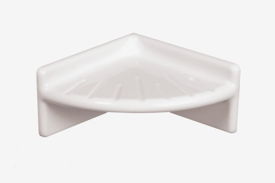 A white, ceramic, triangular corner shelf with a smooth surface, designed to be mounted in the corner of a wall.