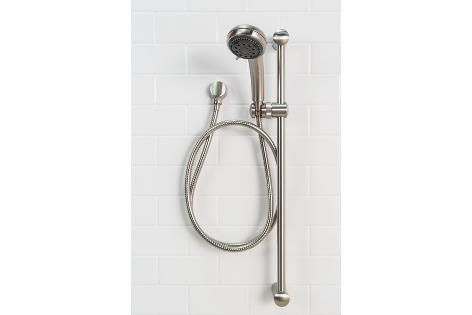 Wall-mounted showerhead with a flexible hose and sliding bar, set against a white tiled background. Modern, sleek design.